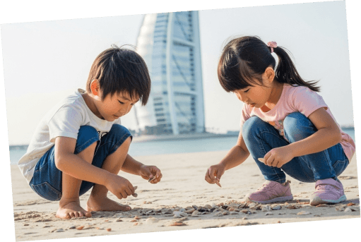 Children playing together on the beach