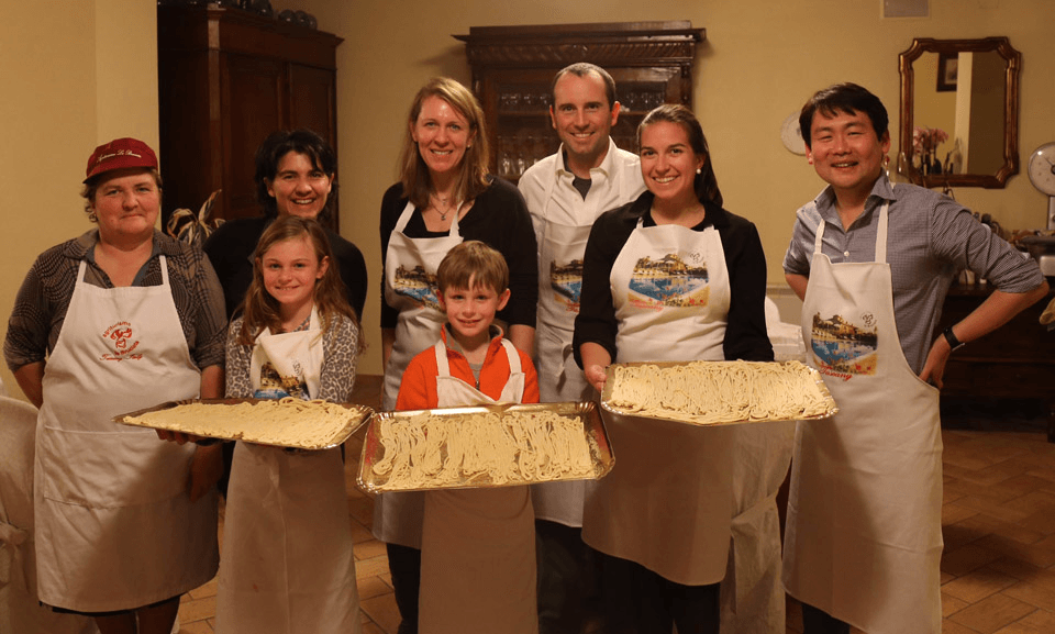 A family cooking together on vacation